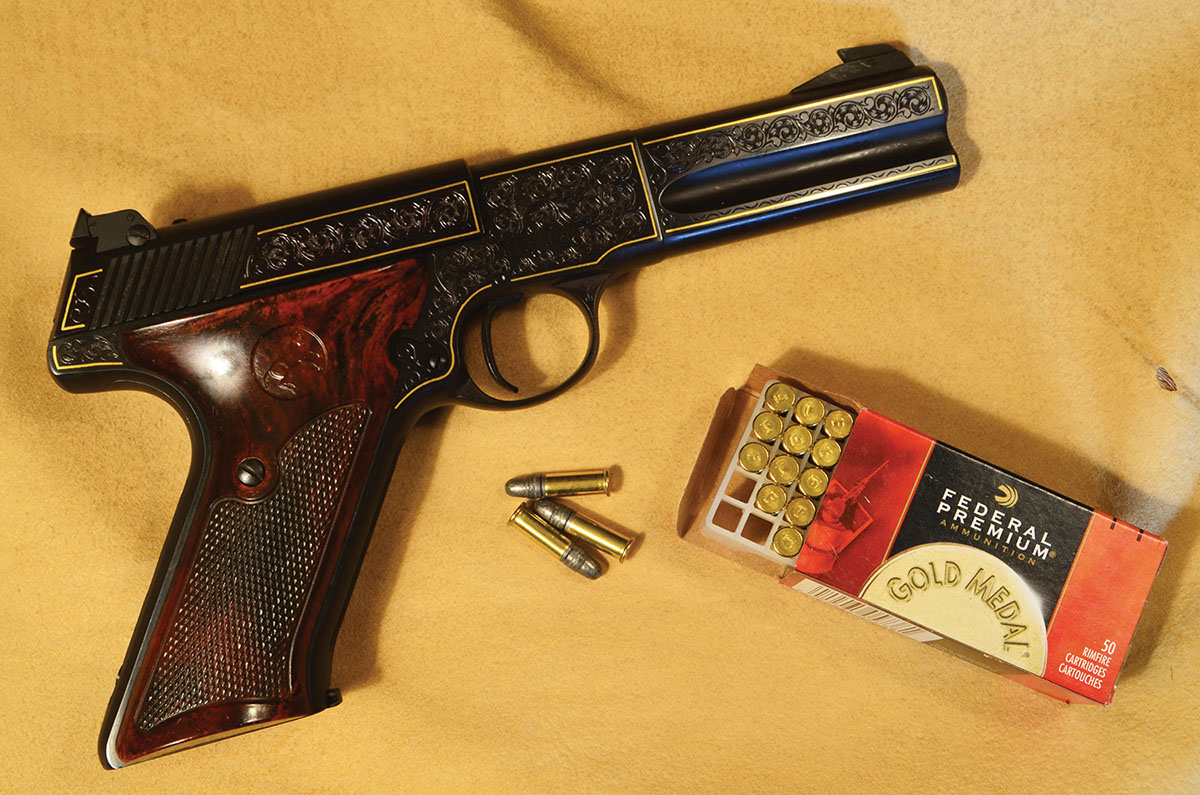 Colt Woodsman Match Target, made in 1950, with engraving and gold inlay added later.
